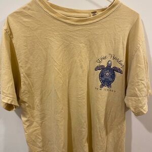 Yellow T-Shirt with Turtle Graphic